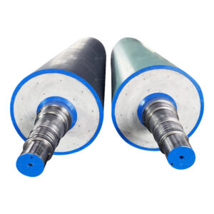 Paper machine artificial stone roll for pressing